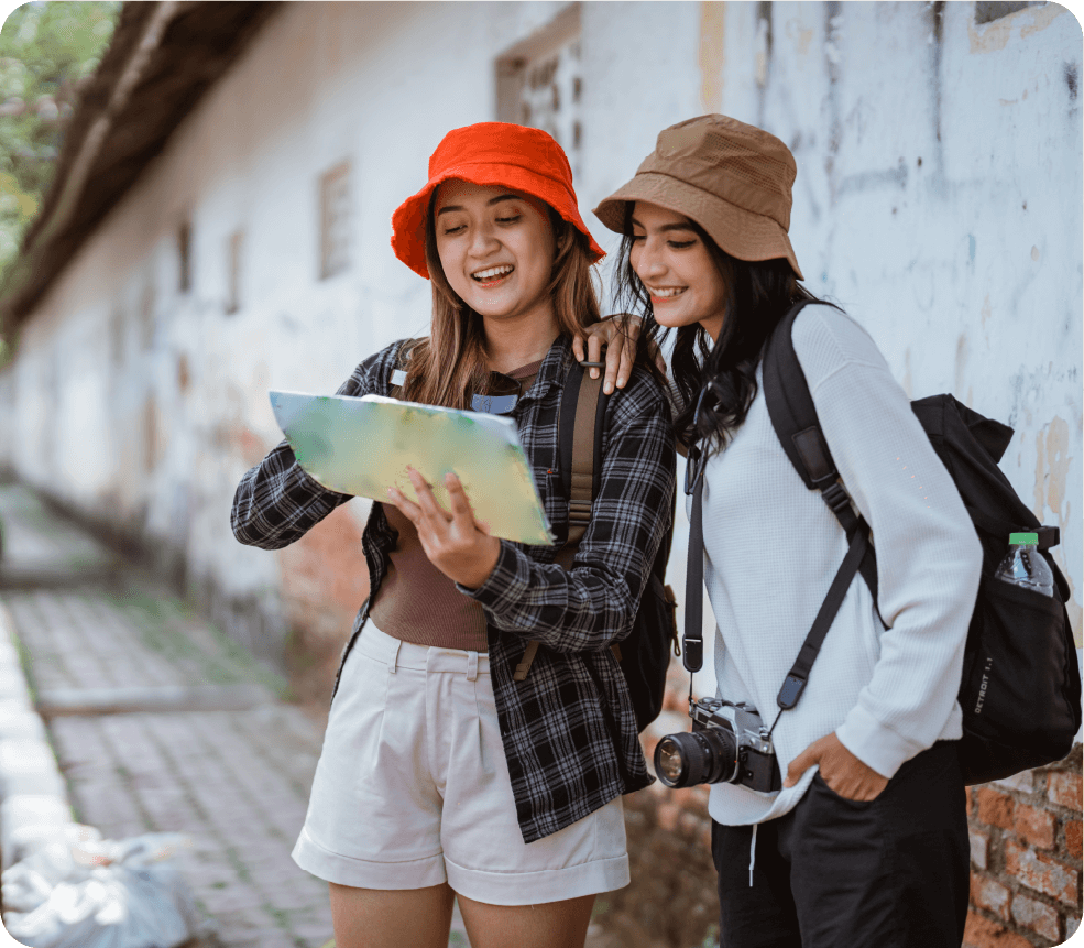 Two tourists on holiday looking for directions